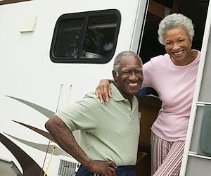 Fun! Travel, Sports, Entertainment Multimedia and Tools senior couple with their RV for travel and entertainment